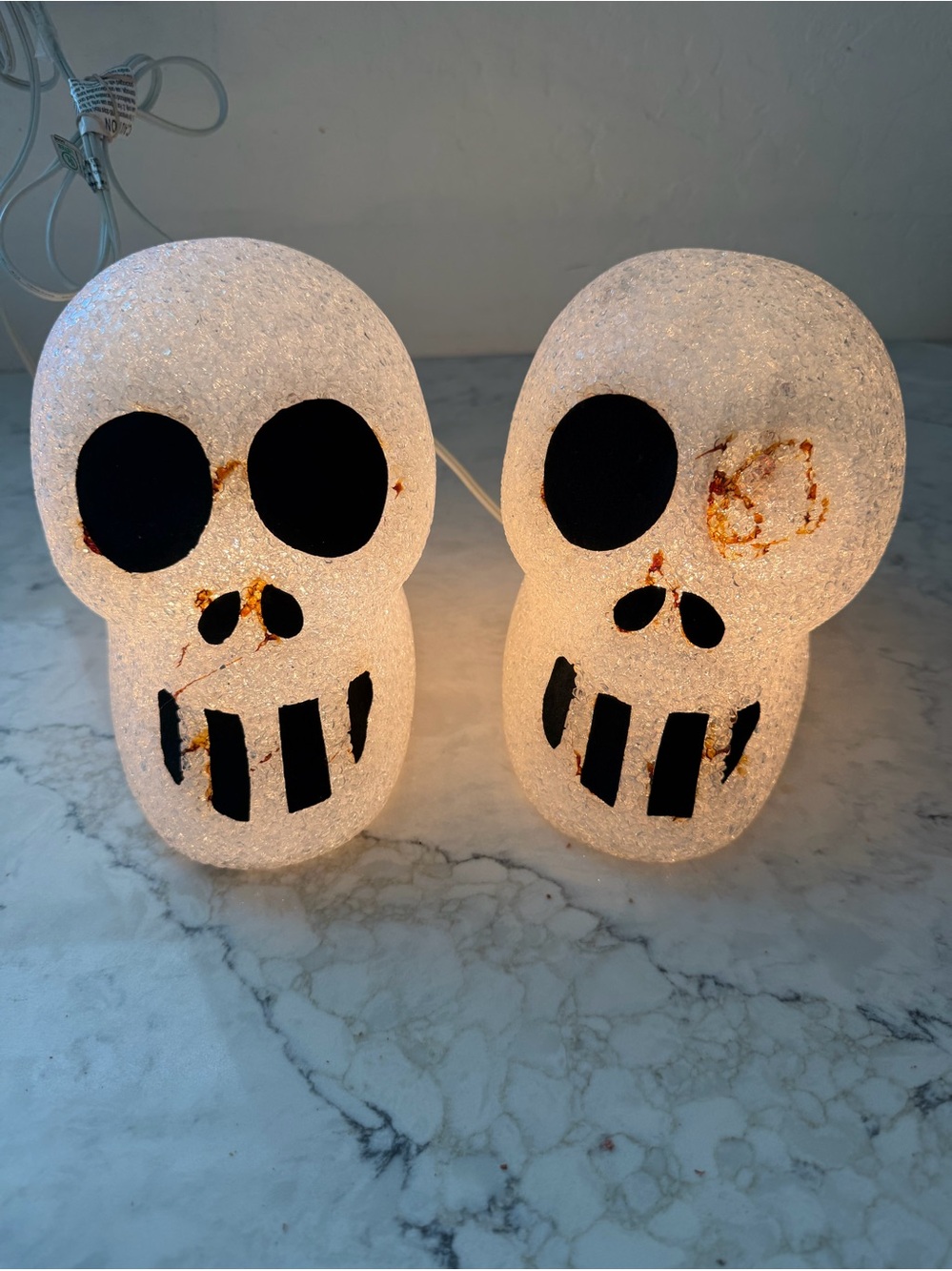 Vintage 1970s Melted Plastic Popcorn Light-Up Skulls - Set of 2